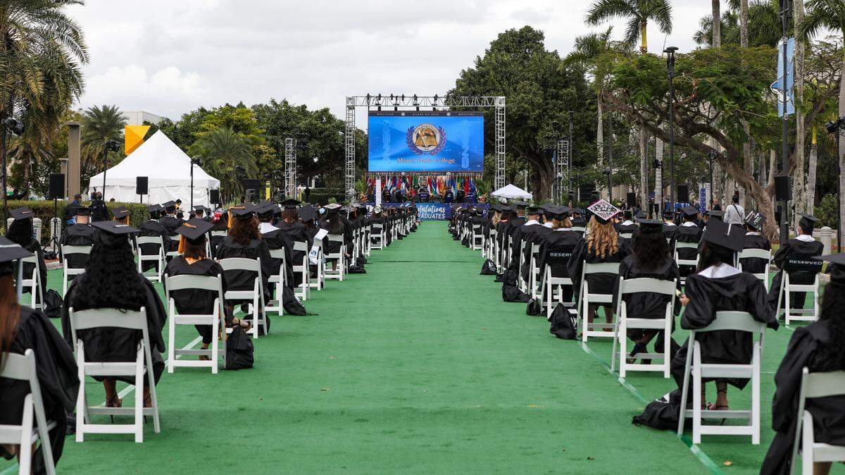 Graduates at the 2020 commencement ceremony at Miami Dade College North Campus in December 2020. Support from IBM will help MDC better prepare its graduates for jobs in technology.