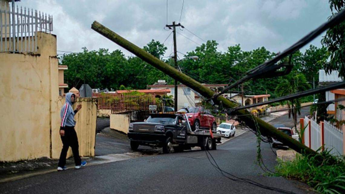 Tropical Storm Isaias knocked out power and caused flooding and small landslides across Puerto Rico.