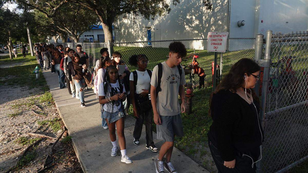 Students waiting to get in to Hollywood Hills High School on the first day of school for the 2024-2025 school year. (Joe Cavaretta/South Florida Sun Sentinel)