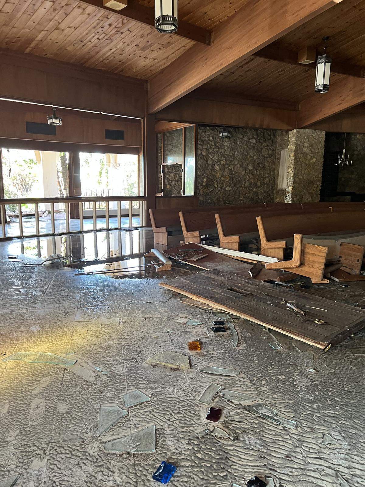 The pews inside Ascension Parish church were pushed to the side by the storm surge during Hurricane Ian on Fort Myers Beach as seen on Oct. 1, 2022.