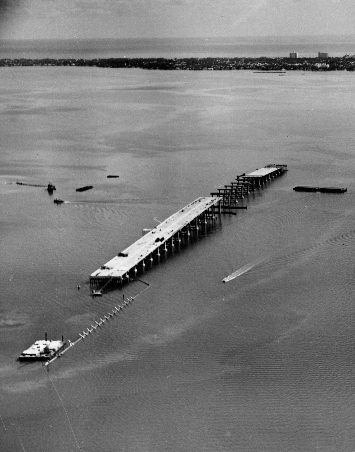 In 1958, Construction of the Tuttle Causeway started with the middle section in the bay.