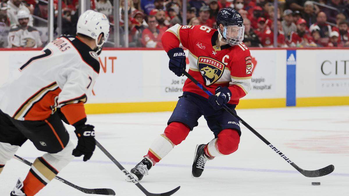 Jan 15, 2024; Sunrise, Florida, USA; Florida Panthers center Aleksander Barkov (16) moves the puck against the Anaheim Ducks during the second period at Amerant Bank Arena.