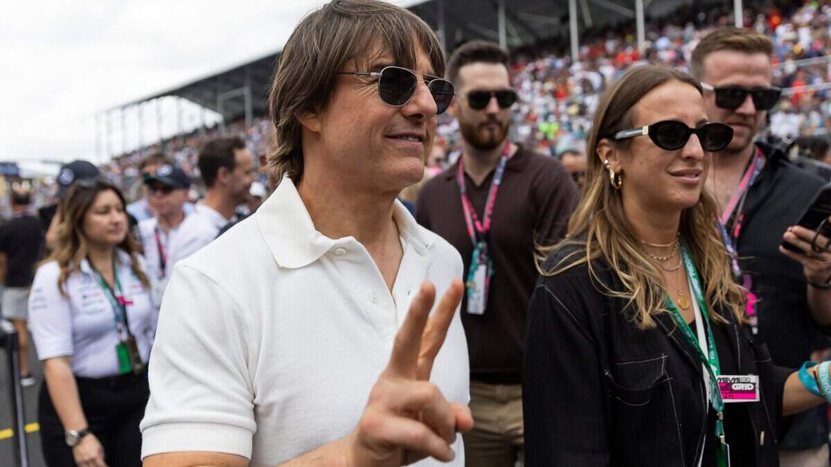 American actor Tom Cruise walks along the grid before the start of the Formula One Miami Grand Prix at the Miami International Autodrome on Sunday, May 7, 2023, in Miami Gardens, Fla.