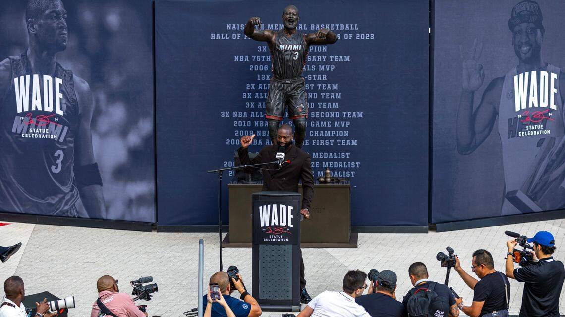 Heat icon Dwyane Wade speaks during the unveiling ceremony of his statue in front of the Kaseya Center on October 27, 2024, in Miami.