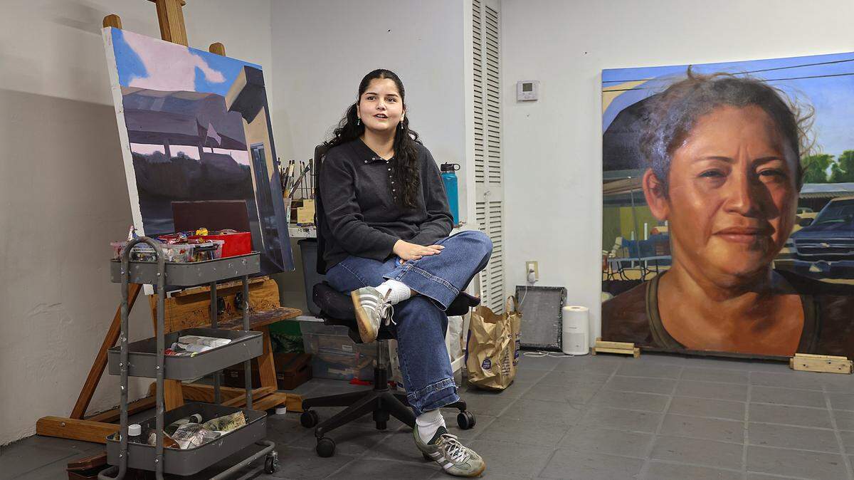 Resident artist Marie Franco describes her art practice while waiting for ICA cohorts during a tour of the Tunnel Projects, a multifaceted art space dedicated to supporting local artists on Saturday, April 11, 2026, in Little Havana, Miami, Florida.
