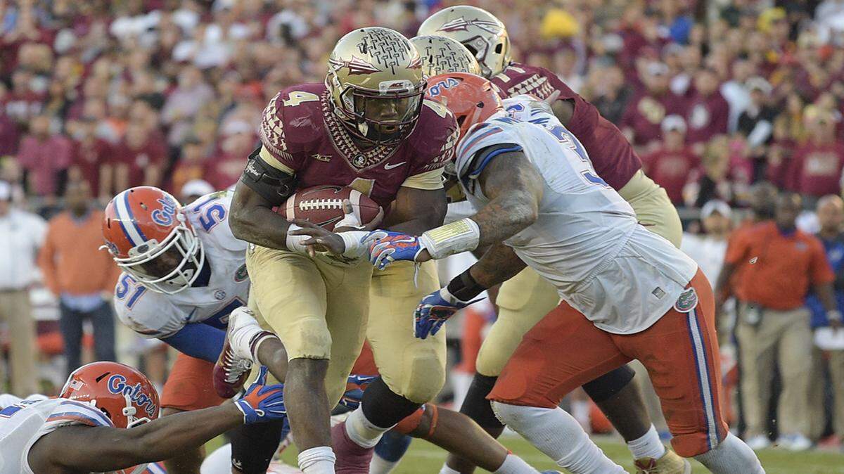 Dalvin Cook, shown against Florida last season, has put his legal troubles behind and is back for the Seminoles. 
