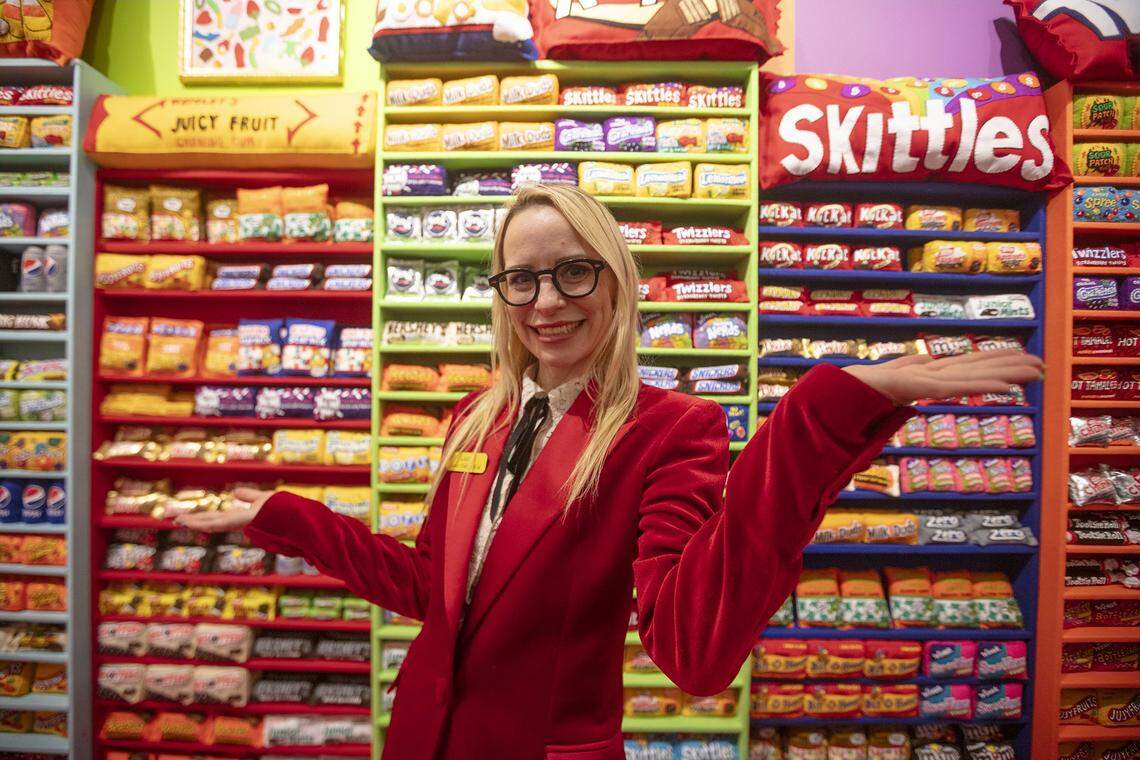Lucy Sparrow poses infront of her art “Sugar Rush” at Art Miami. at ART MIAMI in MIami on Tuesday December 2nd., 2025.