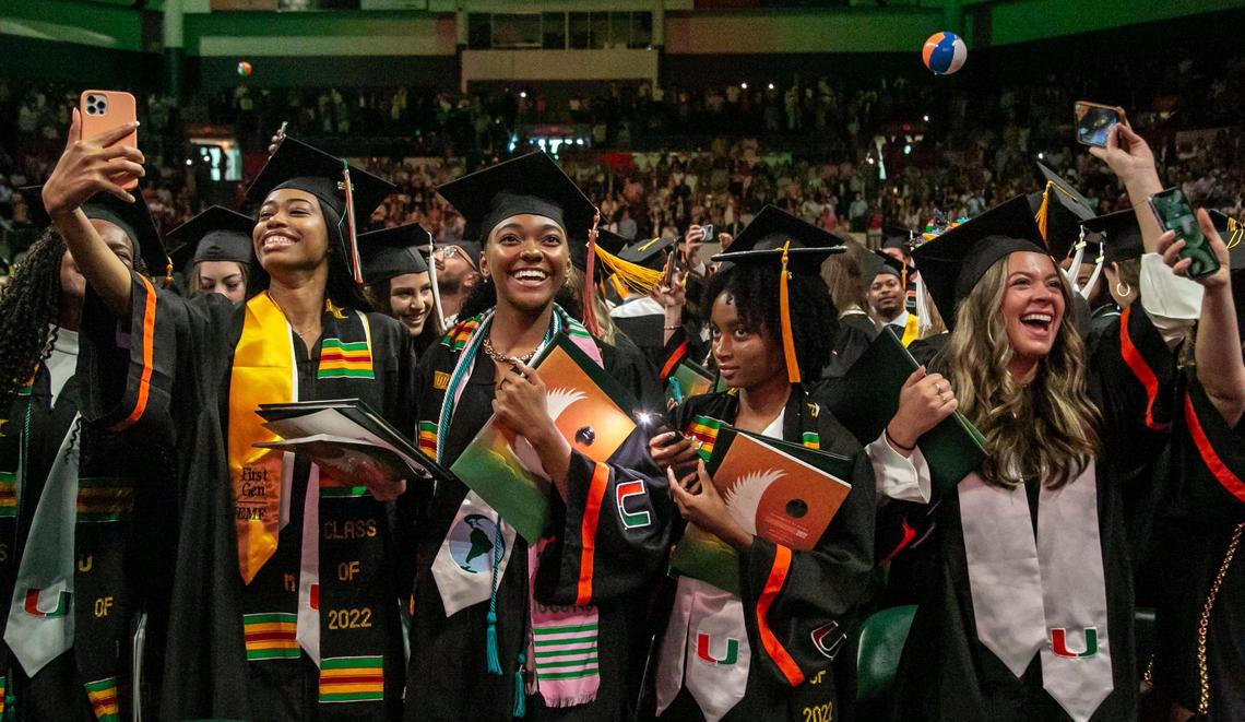 Graduates celebrate after receiving their diplomas at the University of Miami graduation ceremony in Coral Gables on Friday, May 13, 2022.