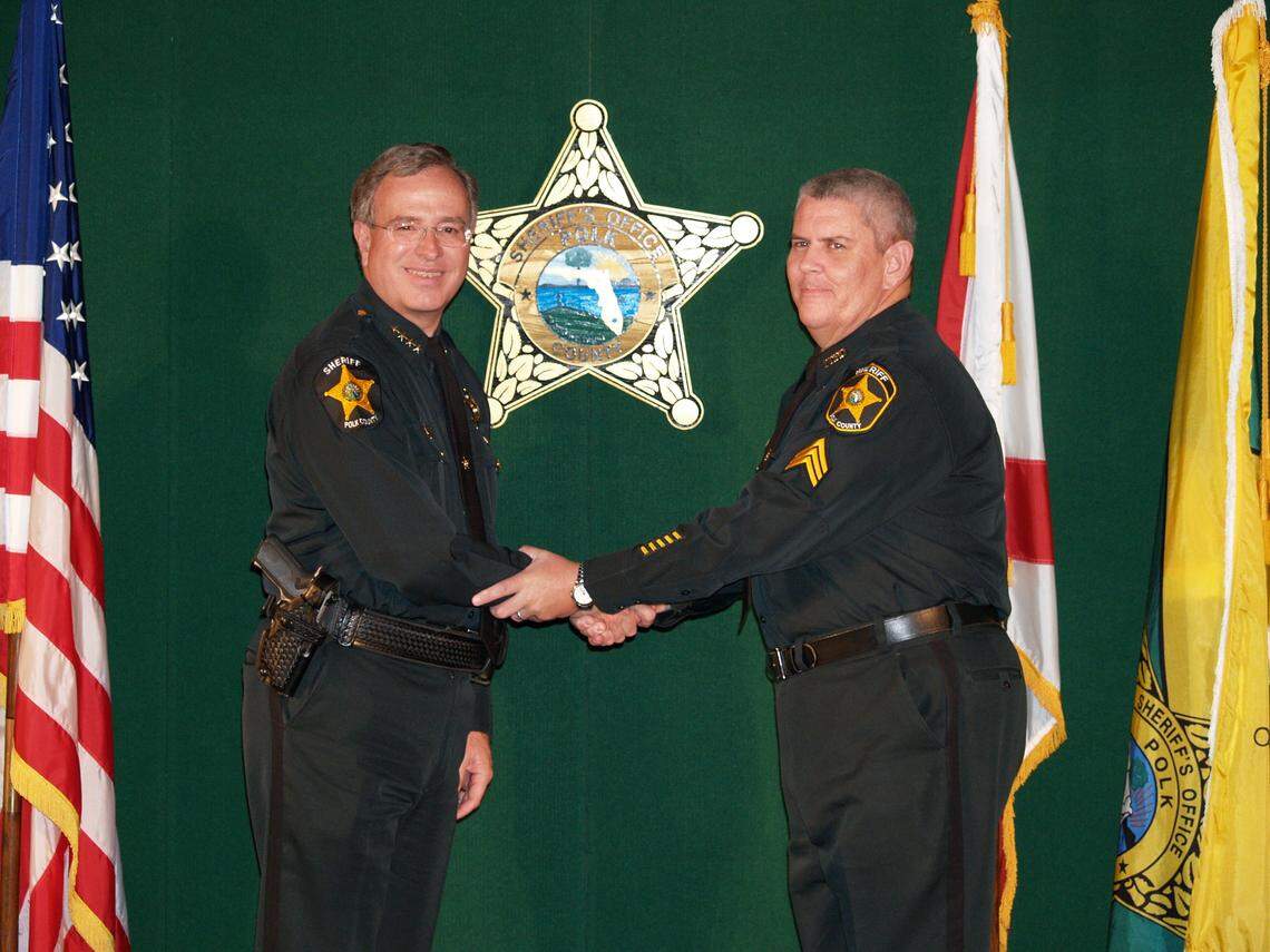 This image shows Polk County Sheriff Grady Judd (left) with retired Polk County Sgt. Dan Cooley, who was killed by a car March 17.