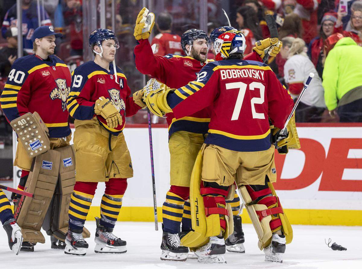 Florida Panthers goaltender Sergei Bobrovsky (72) celebrates with his teammates after winning their NHL game against the Boston Bruins at the Amerant Bank Arena on Wednesday, Feb. 4, 2026, in Sunrise, Fla.