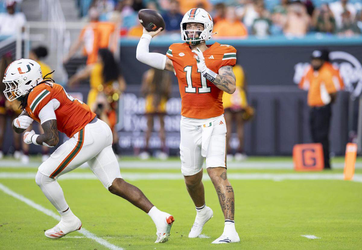 Miami Hurricanes quarterback Carson Beck (11) throws the ball in the first half of his NCAA football game against Bethune-Cookman Wildcats at Hard Rock Stadium on Saturday, Sept. 6, 2025, in Miami Gardens, Fla.