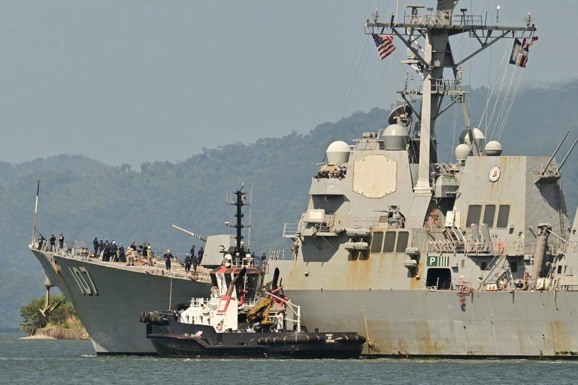 The USS Gravely, a U.S. Navy warship, departs from Port of Spain, the capital of Trinidad and Tobago, on Oct. 30, 2025. In August, the United States began assembling a large-scale deployment of warships in the southern Caribbean Sea near northern Venezuela for a possible military strike. 