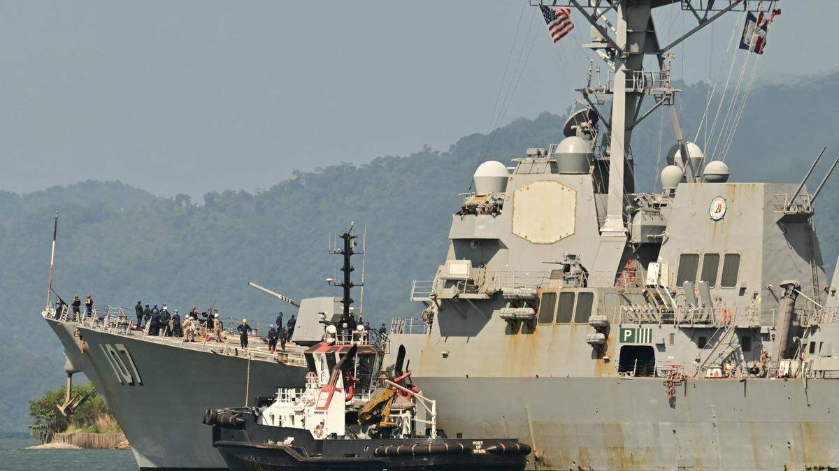 The USS Gravely, a U.S Navy warship, departs from Port of Spain in Trinidad and Tobago on Oct. 30, 2025. The warship is conducting exercises near the northern coast of Venezuela. 