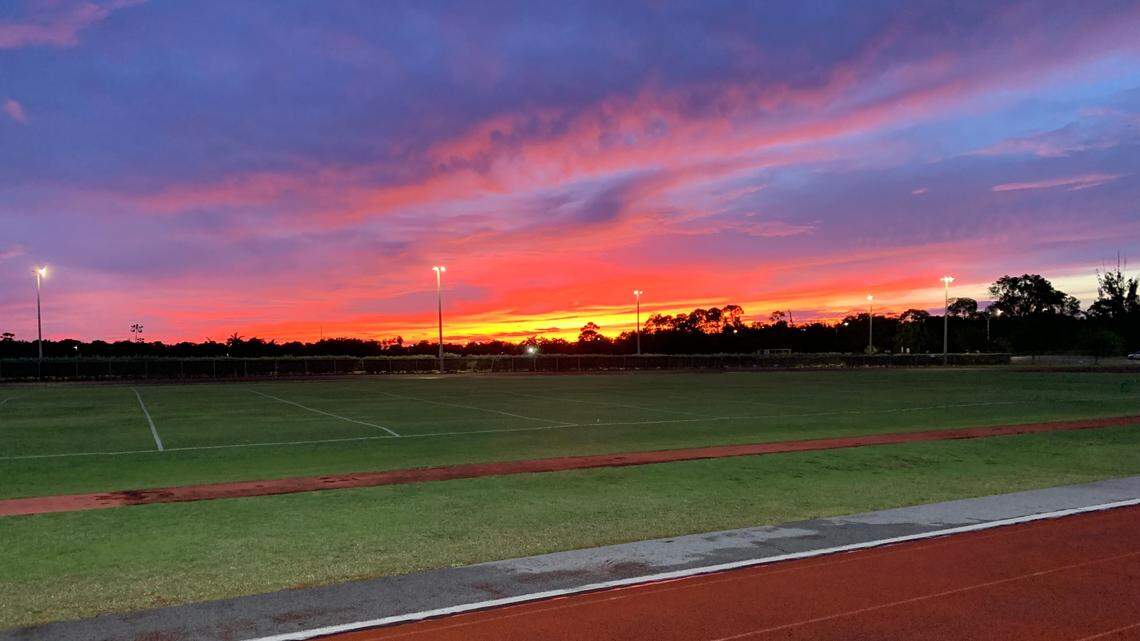 Saharan dust can lead to gorgeous sunsets as in this view from the track at Miami Dade College’s Kendall campus.