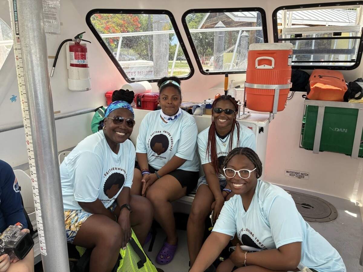 From left, Shellie Baxter, Alana Lara, Marlynn Rollins and Angeni Nettles wait to go out on a dive.