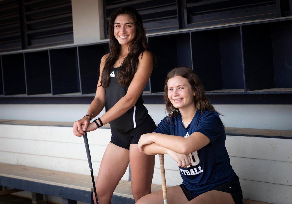 Karissa Kilby, junior golfer from from Honolulu, left, and Isabella Perez, sophomore softball player from Key West, pose for a photo on Wednesday, Aug. 30, 2023, at Florida International University. Kilby and Perez are from places far apart in the world but are both standout athletes in their perspective sports.