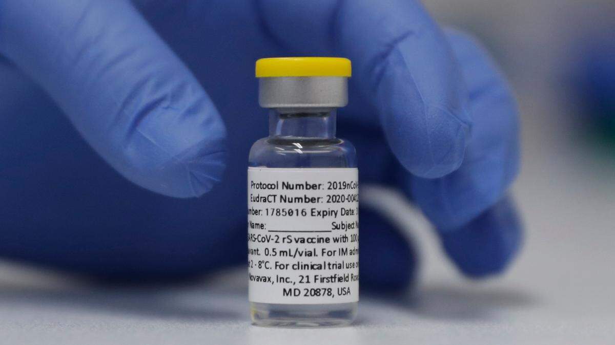 In this Oct. 7, 2020, file photo, a vial of the Phase 3 Novavax coronavirus vaccine is seen ready for use in a trial at St. George’s University hospital in London.