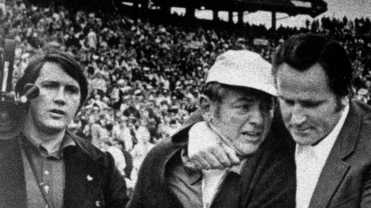 Miami Dolphins defensive coordinator Bill Arnsparger, left (in hat), is pictured with head coach Don Shula after their team’s triumph in Super Bowl VII over the Minnesota Vikings at Rice Stadium in Houston on Jan. 13, 1974.