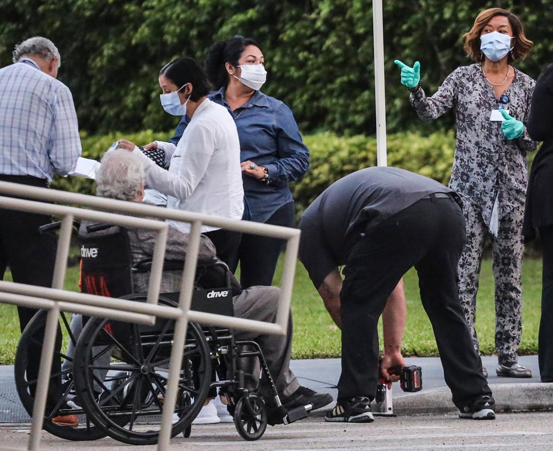 Miami VA medical staff and employees is setting up a physical screening area with an office to screen patients and employees prior to entering the Miami VA hospital at 7:00 am on Wednesday, March 11, 2020.