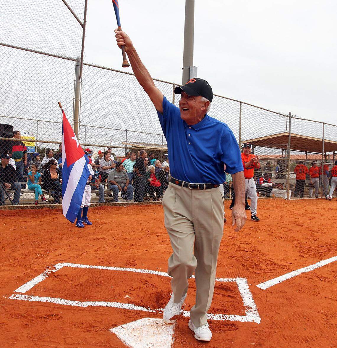 Gus Machado, owner of Gus Machado Ford, reacts after hitting the first throw by comedian Antolin El Pichon, during “Estrellas Cubanas del Baseball,” an event that reunited Cuban baseball players from different generations for a friendly game against players mostly from different media outlets. The event was at Bucky Dent Park in Hialeah in January 2013.