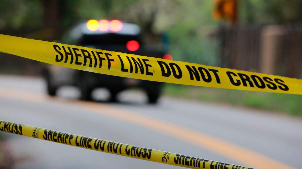 The suspects rammed into a police car before fleeing, deputies said. (AP Photo/Cedar Attanasio)