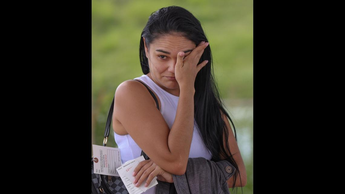 Migrant Sonia, 30, wipes away tears in Eagle Pass as she remembers how she left her child in Venezuela in hope of providing a better life for them both.