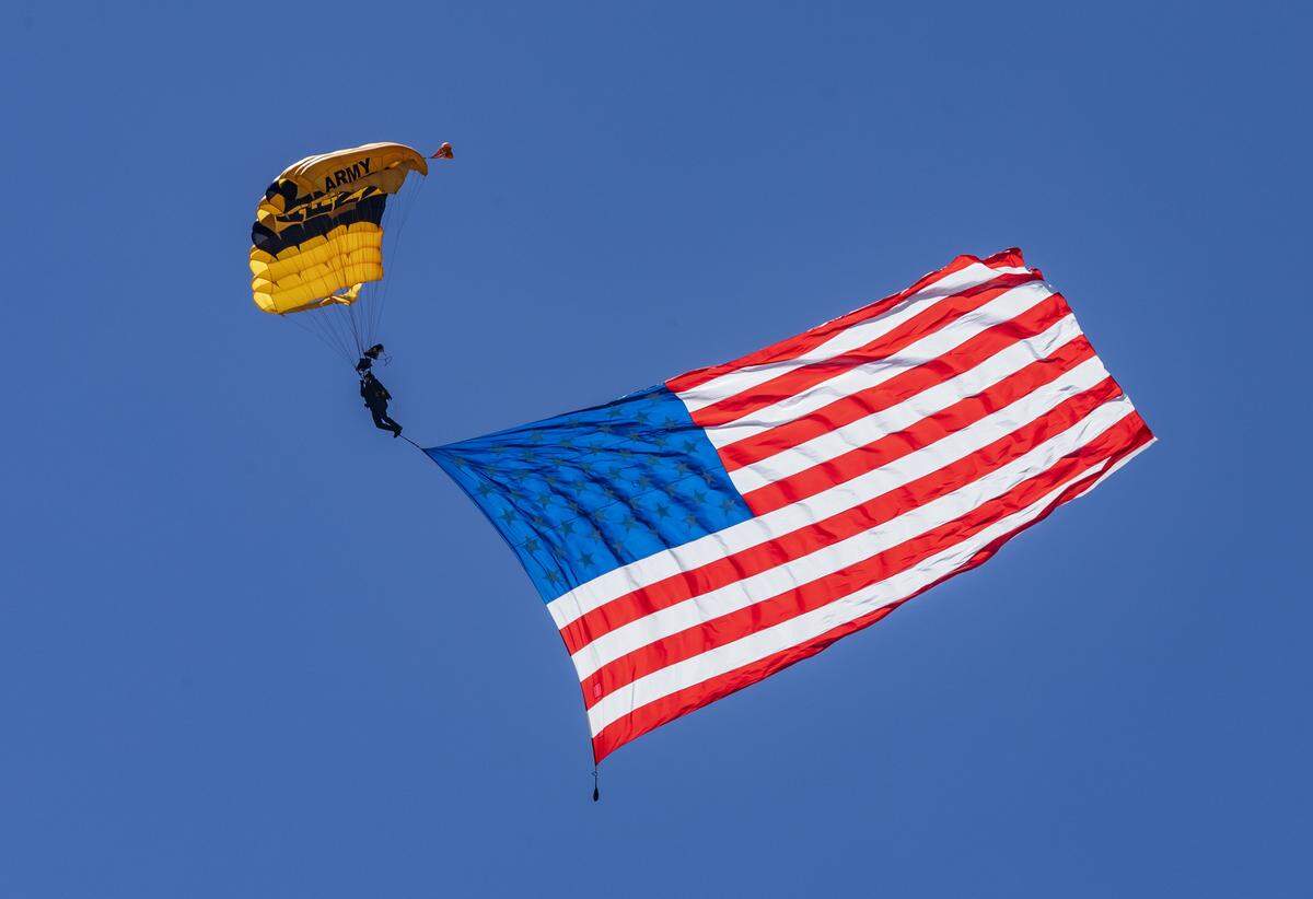 A member of the U.S. Army Golden Knights gets ready to land in South Beach during the Hyundai Air & Sea Show annual National returns Salute to America's Heroes for Memorial Day Weekend celebration, in Miami Beach, on Saturday, May 23, 2026