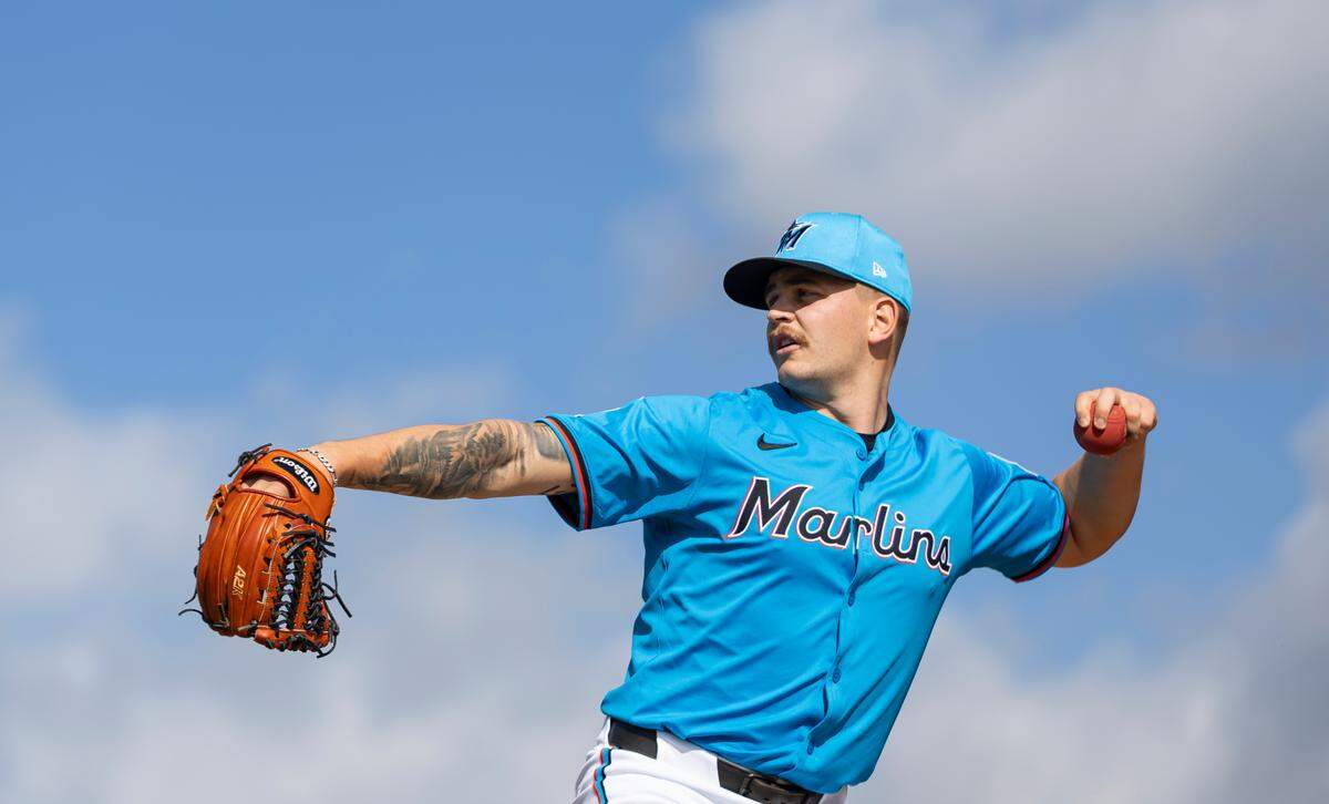 Miami Marlins pitcher Robby Snelling (61) runs drills during spring training workouts for pitchers and catchers at Roger Dean Chevrolet Stadium on Wednesday, Feb. 12, 2025, in Jupiter, Fla.