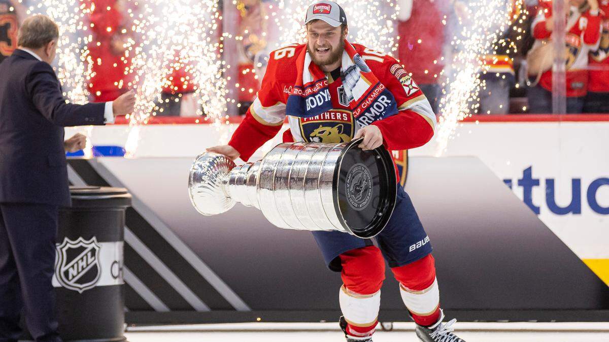 Florida Panthers center Aleksander Barkov (16) skates with the Stanley Cup after defeating the Edmonton Oilers in Game 7 of the Stanley Cup Final at Amerant Bank Arena on Monday, June 24, 2024, in Sunrise, Fla.