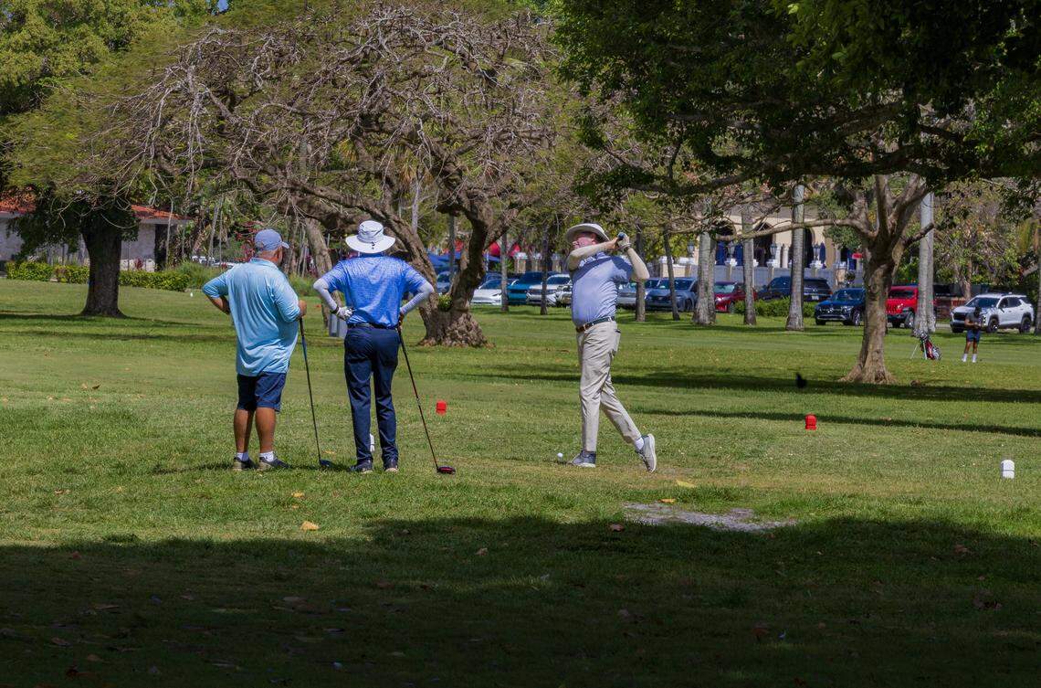 Golfers take turns to take a swing at the Granada Golf Course, in Coral Gables, on Thursday, April 16, 2026.