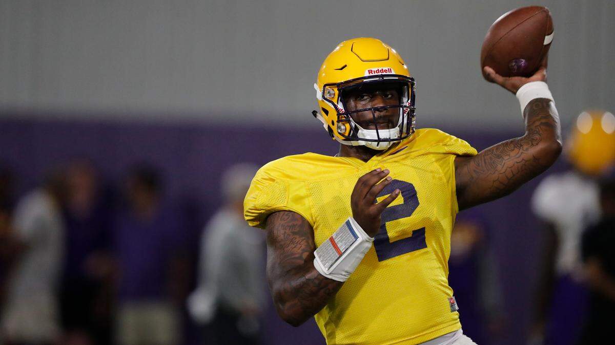 LSU quarterback Lowell Narcisse (2) passes during their NCAA college football practice in Baton Rouge, La., Monday, Aug. 6, 2018. (AP Photo/Gerald Herbert)
