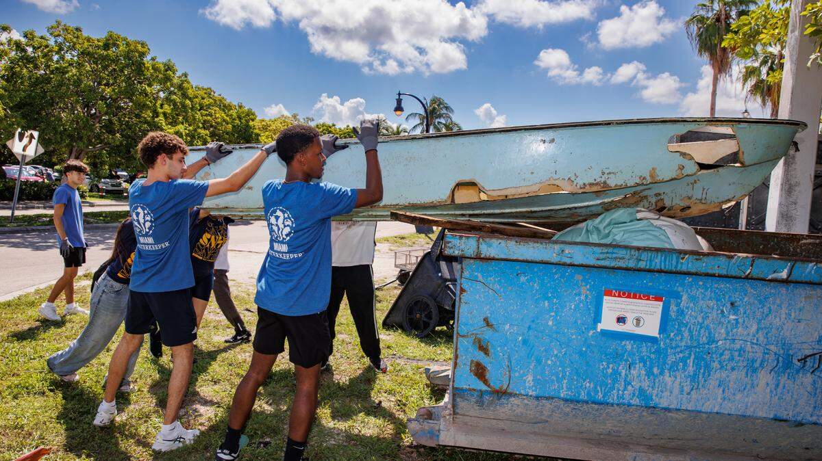 At the 2024 International Coastal Clean-Up, volunteers with Miami Waterkeeper sort through waste and marine debris dumped in Biscayne Bay.