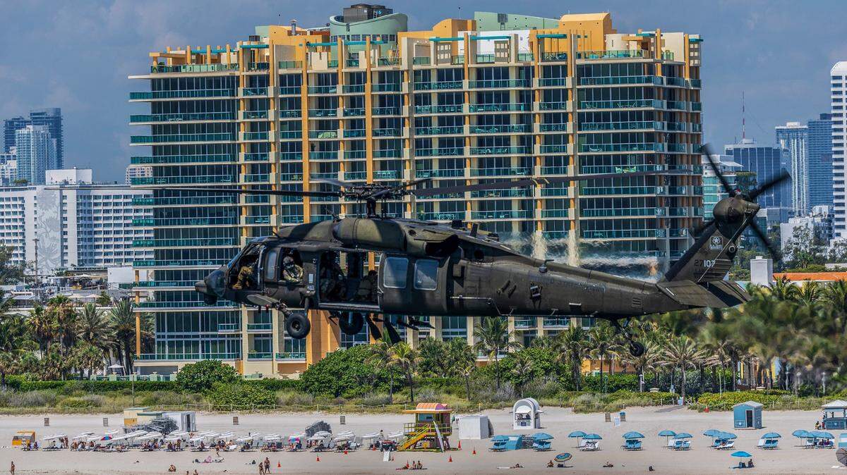 A UH-60 Black Hawk from the 8-229th Assault Helicopter Battalion, based at Fort Knox, Kentucky, flies over South Beach during a rehearsal for the Hyundai Air & Sea Show, part of the annual National Salute to America’s Heroes, in Miami Beach on Friday, May 23, 2025.