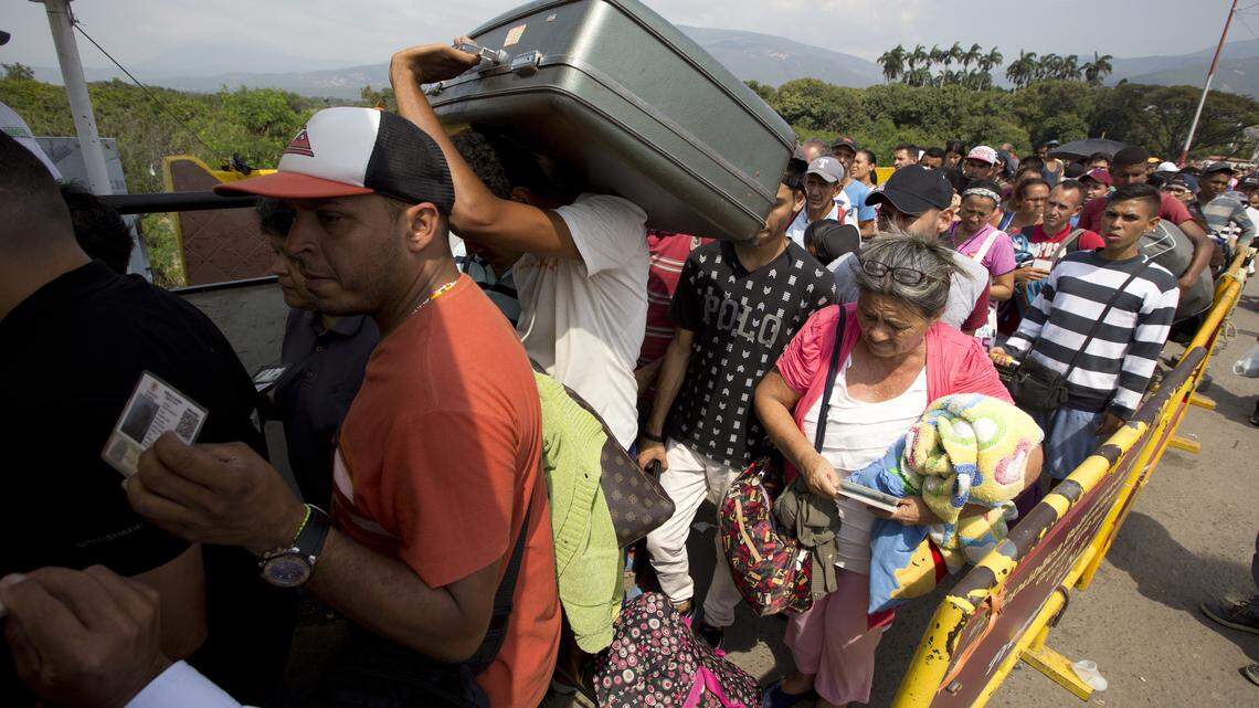Venezuelans cross the International Simon Bolivar bridge into Cucuta, Colombia, in February. Rising numbers of Venezuelans are fleeing in a burgeoning refugee crisis.