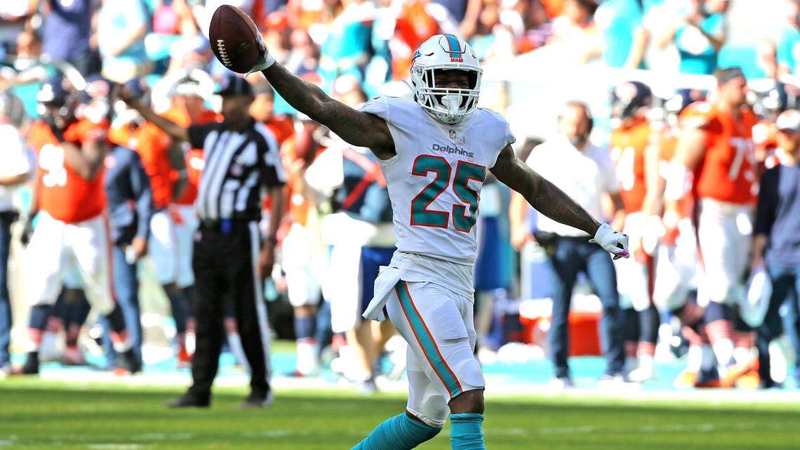 Miami Dolphins Xavien Howard recovers a fumble as they play the Chicago Bears at Hard Rock Stadium in Miami Gardens, Florida, October 14, 2018. Sunday, October, 14, 2018