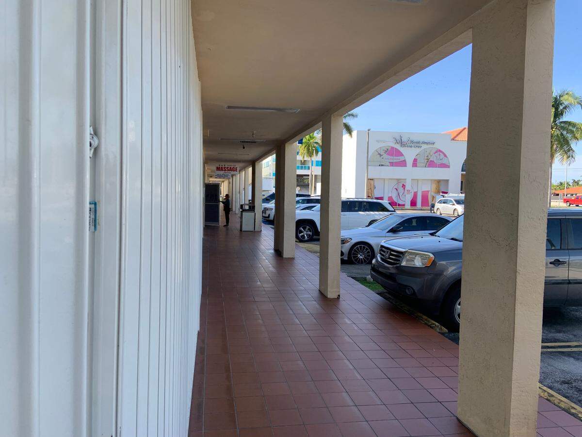 In the foreground, the Xiluet Plastic Surgery center that’s closed by suspension. In the distance, the main Xiluet Plastic Surgery center that has had several state complaints and is dealing with a few lawsuits.