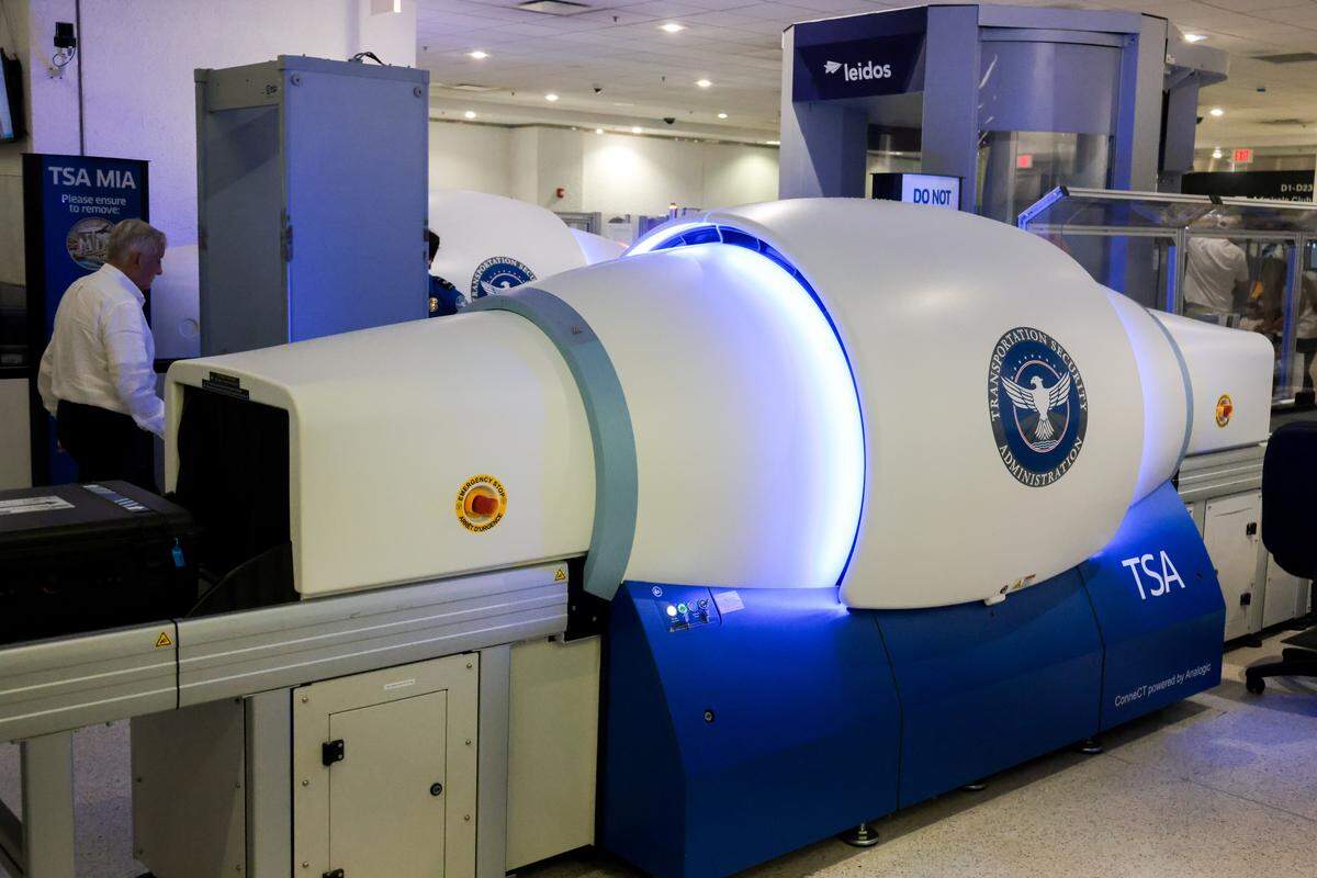 A view of the new advanced screening technology equipped with 3D computed tomography (CT) scanners at TSA Checkpoint 2 at Miami International Airport on Tuesday, Nov. 25, in Miami, Fla.
