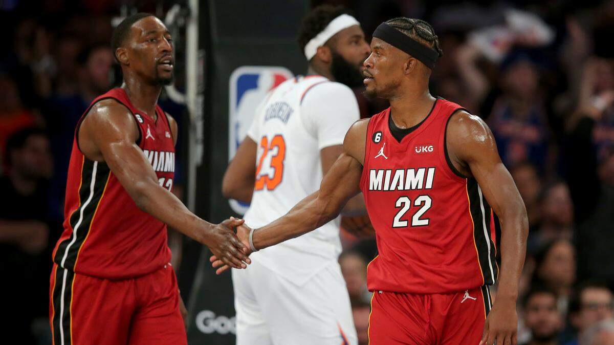 Miami Heat center Bam Adebayo (13) and Miami Heat forward Jimmy Butler (22) high five during the fourth quarter of game one of the 2023 NBA Eastern Conference semifinal playoffs at Madison Square Garden.