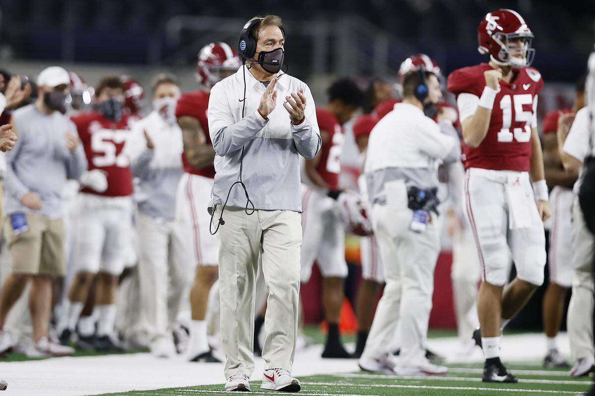 Head coach Nick Saban of the Alabama Crimson Tide celebrates from the sidelines during the fourth quarter of the 2021 College Football Playoff Semifinal Game at the Rose Bowl Game presented by Capital One against the Notre Dame Fighting Irish at AT&T Stadium on January 01, 2021 in Arlington, Texas.