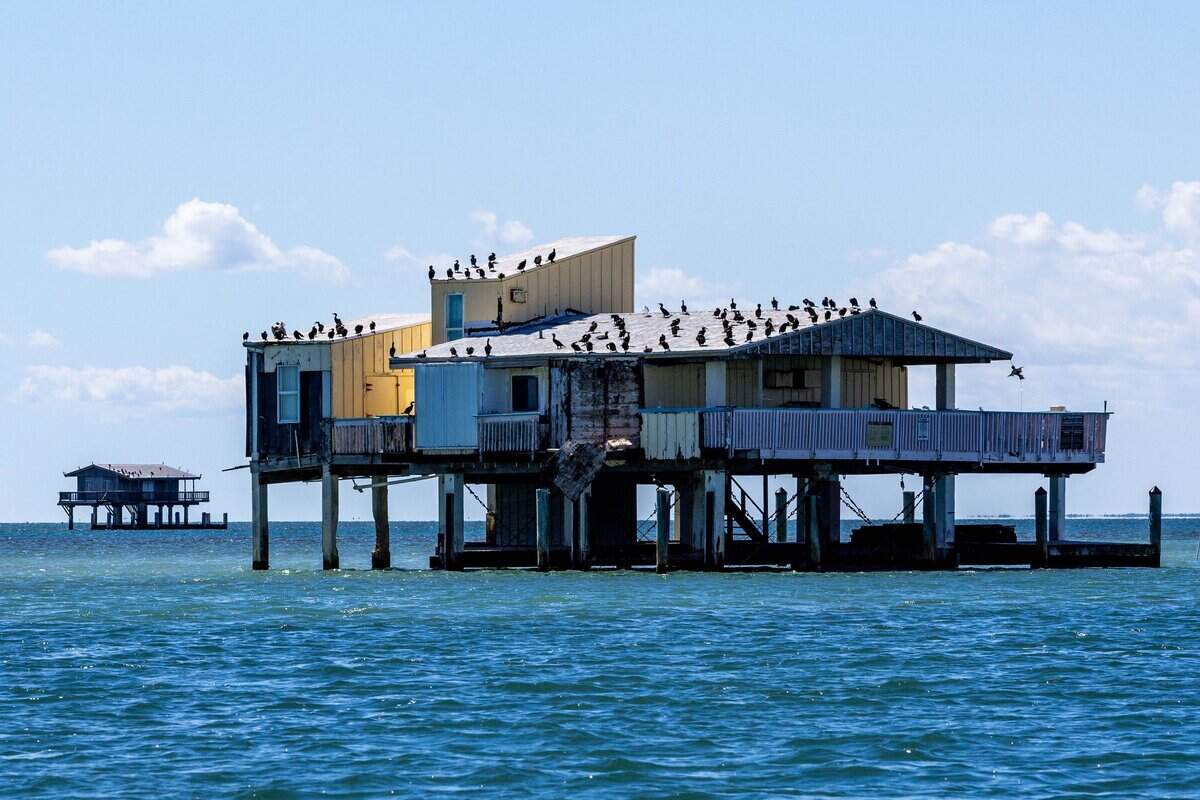 A Stiltsville house sits on the edge of Biscayne Bay on Wednesday, October 15, 2025, in Miami, Fla.