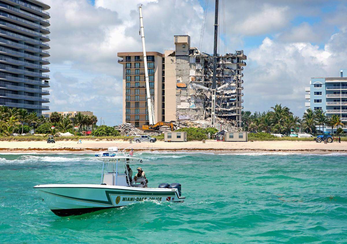 A Miami-Dade Marine Patrol Unit patrolled off the coast as search teams looked for survivors at the Champlain Towers South Condo in Surfside in 2021.