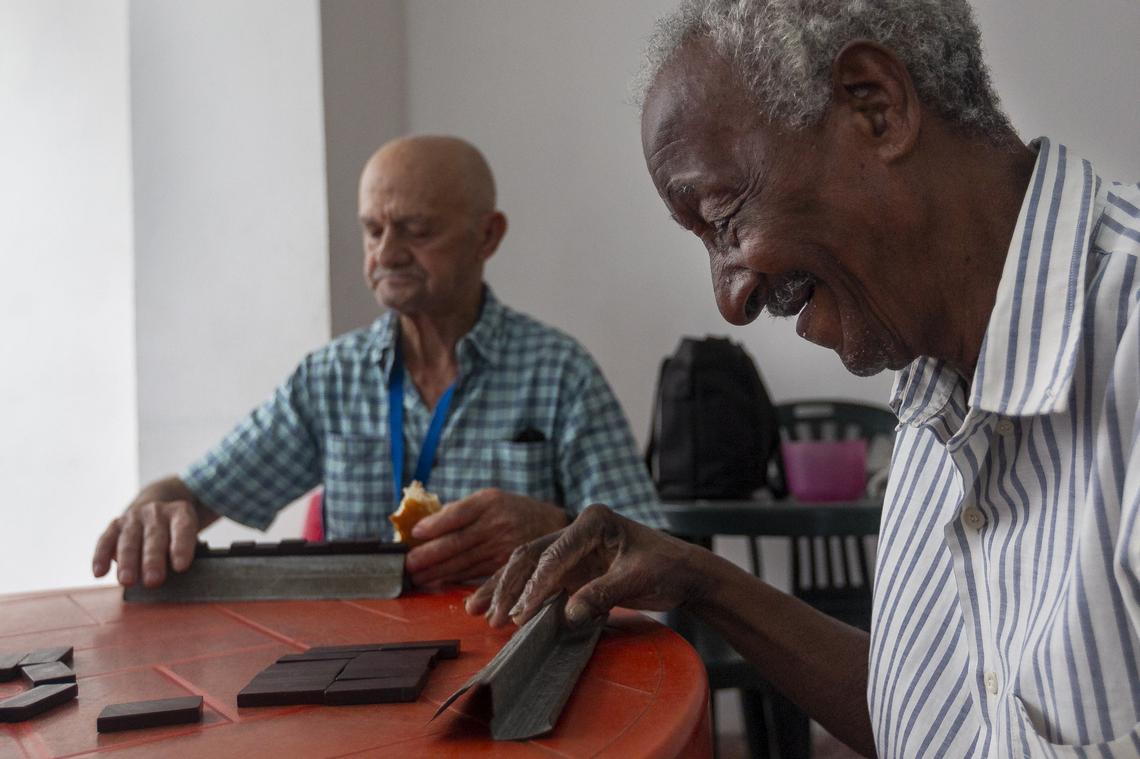 Félix Eulogio Abreu Herrera, 93, plays dominoes at a Circulo de Abuelos in Old Havana.