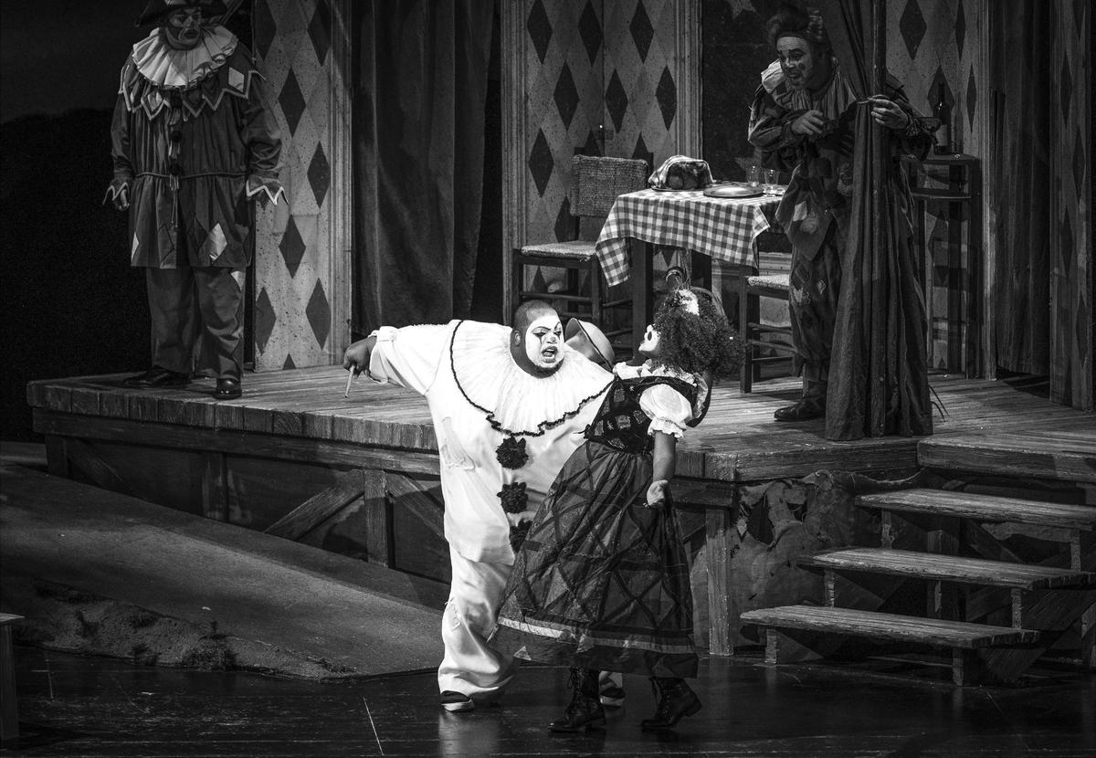Limmie Pulliam, left, and Kearstin Piper Brown perform the stabbing scene in Florida Grand Opera’s production of ‘I pagliacci’ at the Adrienne Arsht Center in Miami.