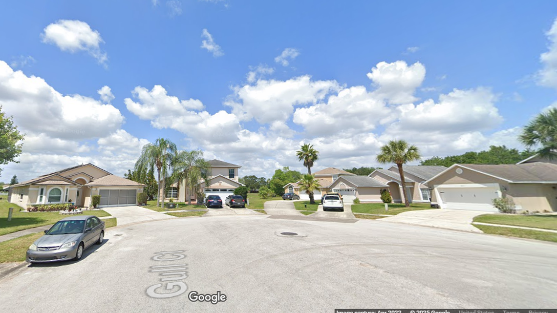 The suspect is accused of killing Carmen Rosa Neira Ochoa, 56, as she sat on a screened-in porch behind her home on Gull Court, police said.