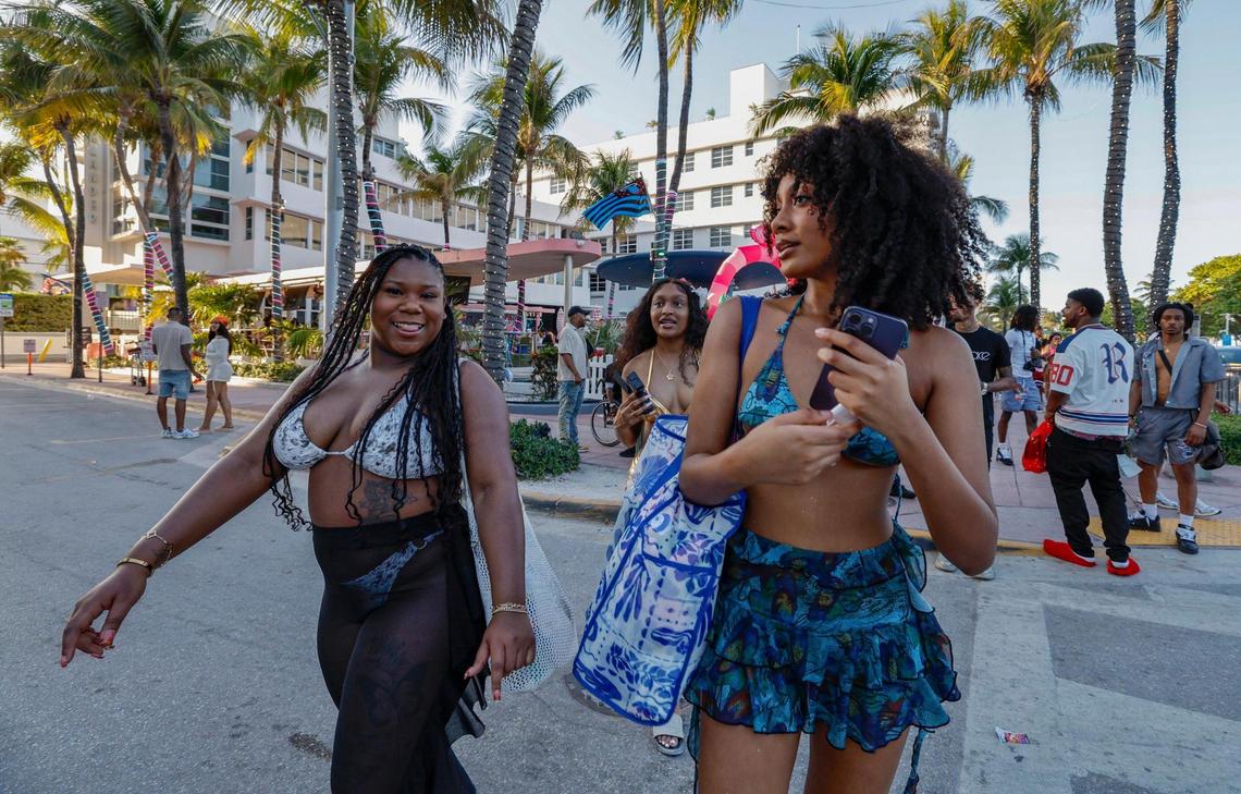Atlanta spring breakers Gabrielle Avant-McClain and Artura Thomas walk along along Ocean Drive, Miami Beach, Florida on Friday, March 14, 2025.