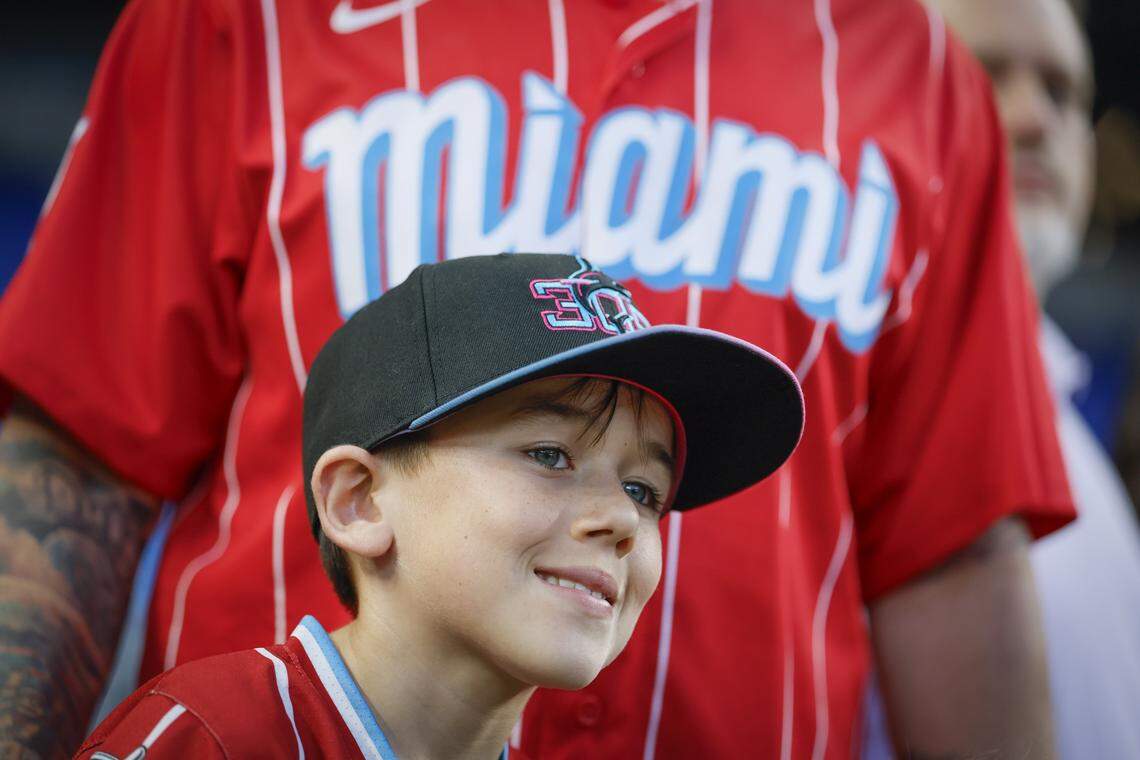 Dominic Healy, 9, watches the festivities during Marlins Fan Fest at loanDepot park in Miami on Saturday.