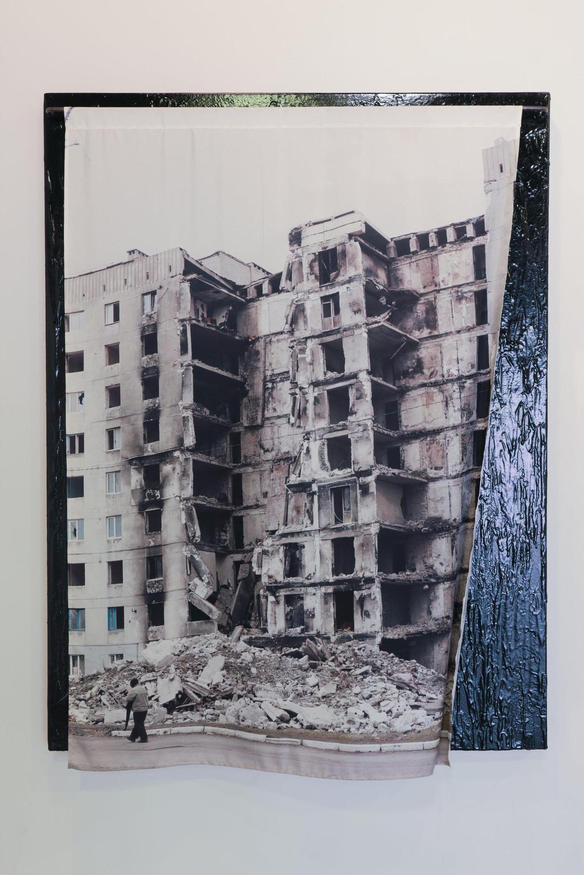 “Broken Pole” by renowned Ukrainian artist Nikita Kadan brings a certain relevance to the show. It is a photo of a partially destroyed building in the Donbas region of Ukraine, which was invaded by Russia in 2014.