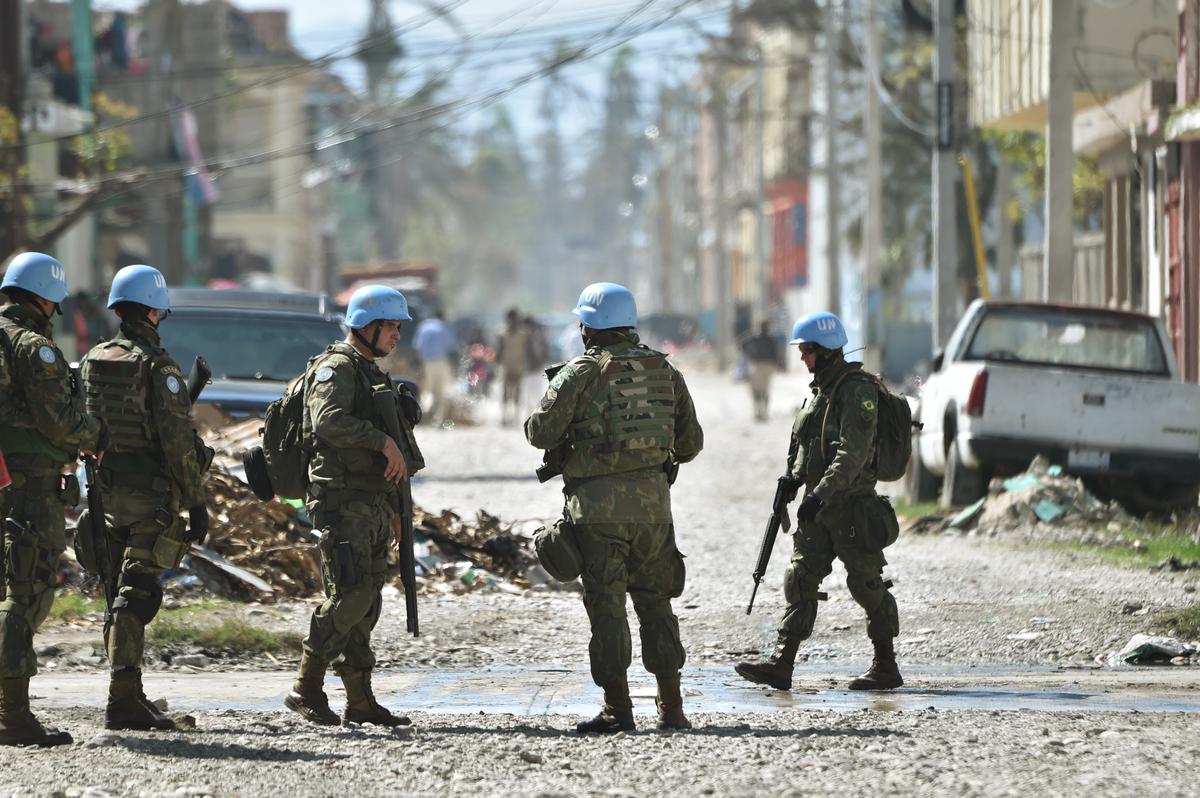 Brazilian members of the United Nations Stabilization Mission in Haiti (MINUSTAH) secure a perimeter before arrival of U.N. Secretary-General Ban Ki-moon at a shelter in the Lycee Phillipe Guerrier in the city of Les Cayes, in the southwest of Haiti, on Oct. 15, 2016.