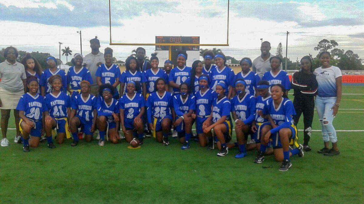 The Dillard High flag football team poses after defeating Edison in the regional finals.