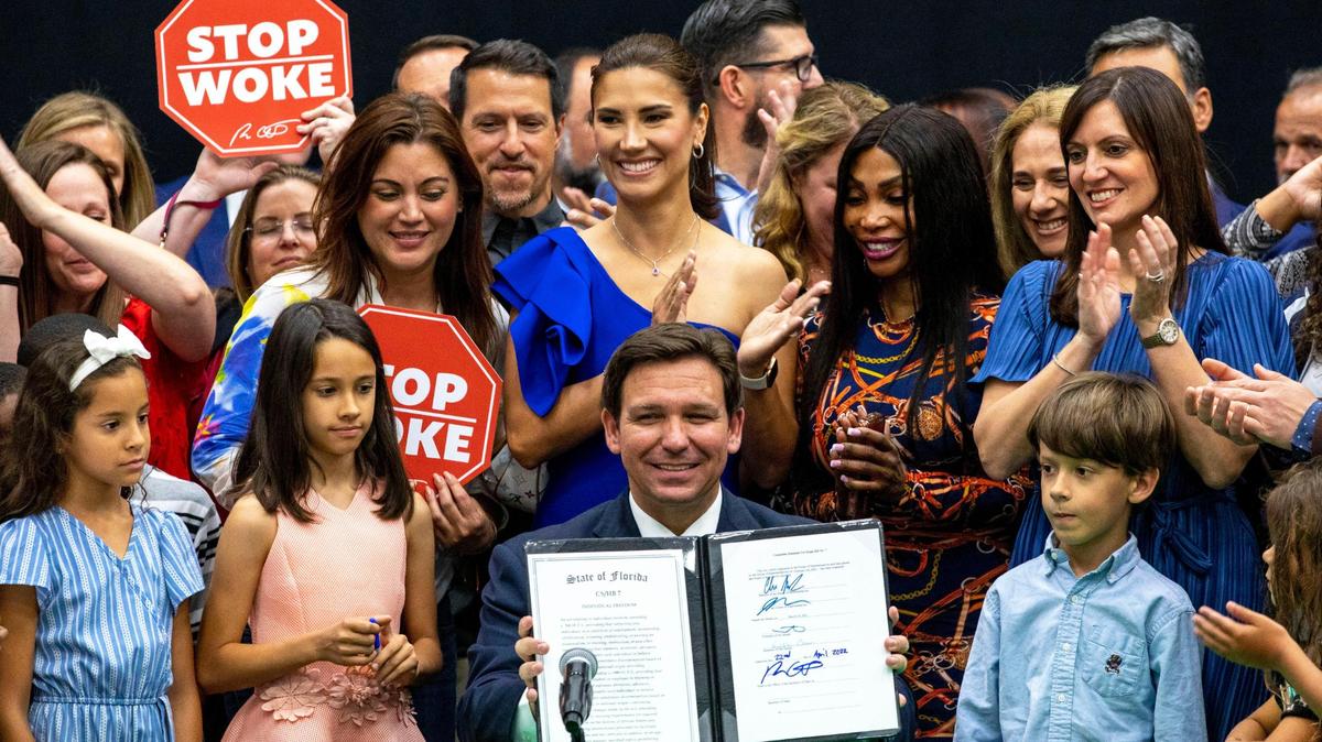 Florida Gov. Ron DeSantis reacts after signing HB 7, ‘Individual Freedom,’ also dubbed the ‘stop woke’ bill, at Mater Academy Charter Middle/High School in Hialeah Gardens, Florida, on Friday, April 22, 2022.